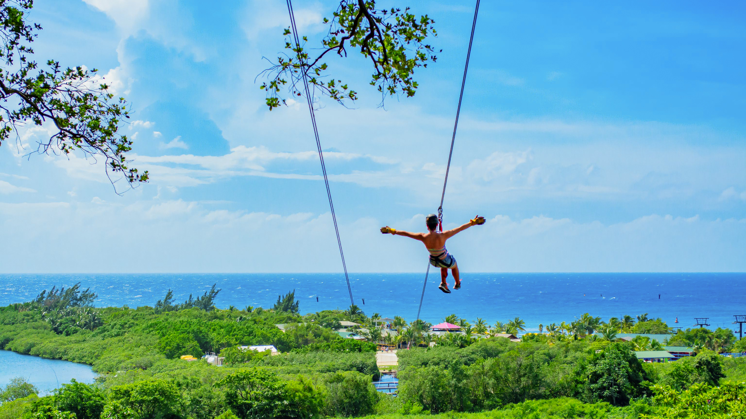 Extreme zip lining over Roatan rainforest
